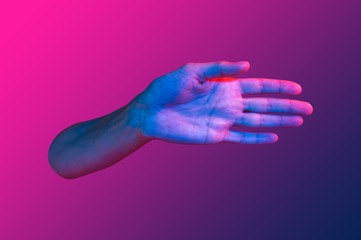 Hand in a pop art collage style in neon bold colors. Modern psychedelic creative element with human palm for posters, banners, wallpaper. Copy space for text. Magazine style template. Zine culture.