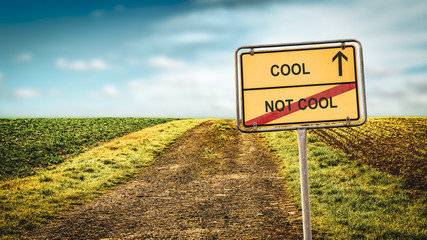 Obraz premium Street Sign to Cool versus Uncool