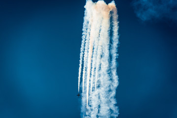 Formation of air planes on the blue sky during the airshow