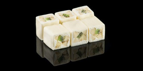 Sweet dessert rolls with banana and kiwi on black background with reflection, isolated. E-commerce shot