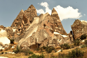Fototapeta na wymiar Central Turkey. Cappadocia. Caves in the mountains.