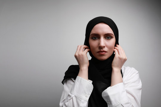 Muslim woman in hijab over white background. Concept, young.