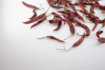 Dried red chili or chilli cayenne pepper isolated on white background cutout