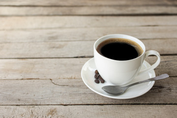 black coffee in a coffee cup  isolated on wood background. with clipping path.