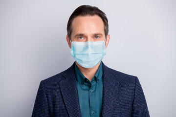 Close-up portrait of his he nice attractive serious middle age brunet guy office executive wearing formalwear sterile mask cv resume looking job isolated over light white gray pastel color background
