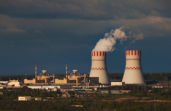 Cooling towers of a nuclear power plant in the light of the sunset