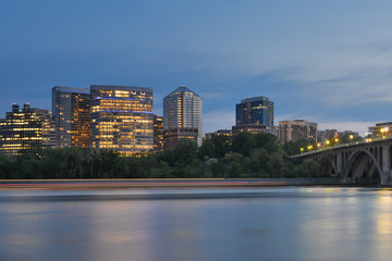Washington DC, skyline with a view from Arlington, Rosslyn and Potomac river and Key Bridge at night