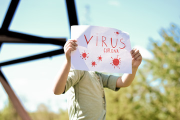 masked little boy during the coronavirus pandemic. Quarantined child.