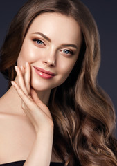 Obraz premium Beauty long hair woman curly hairstyle natural makeup