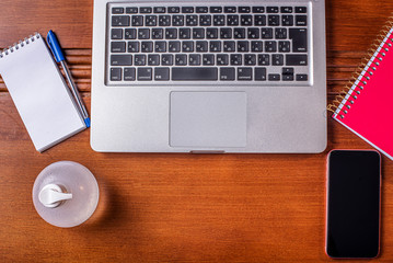 Office desk workspace home office mock up with laptop, smartphone, coffee. Fashion, beauty or lifestyle blog concept. Home office, Stay home. Covid-19. 
Alcohol gel

Q