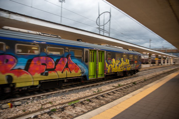 colorful trains at the station in speed