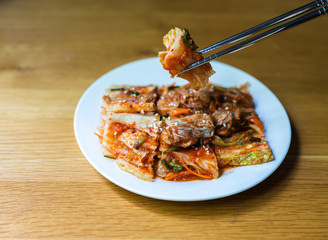 Gimchi or Kimchi are Korean spicy fermented pickles.