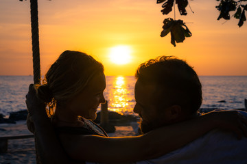 Loving couple at sunset.