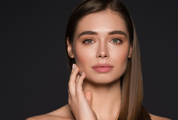 Young woman face macro natural make up