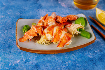 Boiled yummy lobster organic on plate with lemon butter sauce