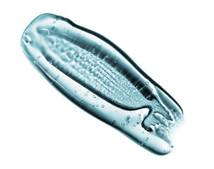 Transparent gel with bubbles close-up. Smear of face gel cream. The texture of gel cream. A sample of a cosmetic product. Antibacterial gel.