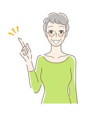 笑顔で指をさす正面向きの女性