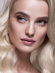 Naklejka premium Blonde platinum hair woman beauty face portrait