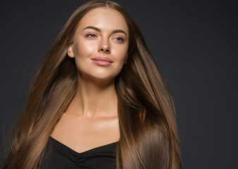Beautiful smooth long hair woman natural make up face portrait beauty