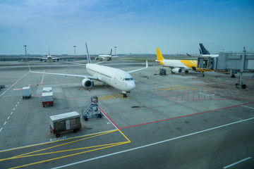 Aviation business stock market down in the coronavirus spread concept, Aeroplane on the airport runway