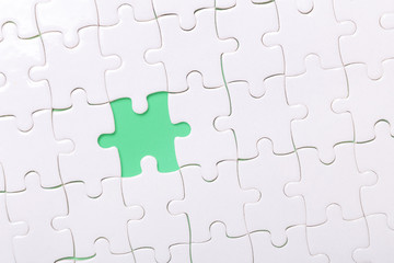 Missing piece of puzzle on white background