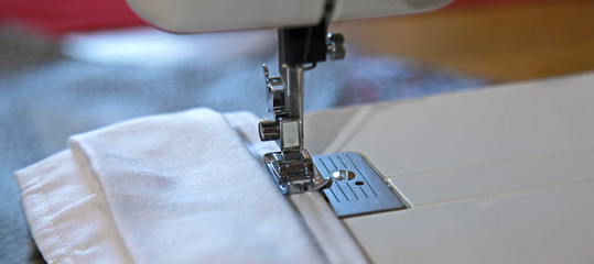 Fabrication artisanale de masques pour le coronavirus