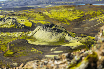 Laki Crater Iceland. Volcanic crater covered wit green moos. Volcanic Landscape. Volcano fissure eruption. Iceland landscape. Icelandic high land. Volcanic fissure with a green moss and lava field - Powered by Adobe