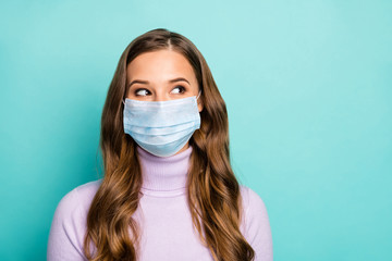 Close-up portrait of her she attractive pretty wavy-haired lady wearing mask overthinking creating solution co2 air pollution isolated bright vivid shine vibrant teal turquoise green color background