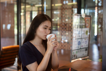 Wait and drink in the cafe.