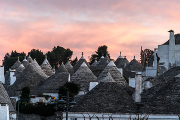 Alberobello, town in Italy’s Apulia region, and its trulli, whitewashed stone huts with conical...