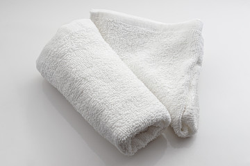 Fototapeta na wymiar white towel on white background