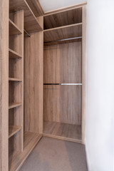 Empty shelves in the wardrobe