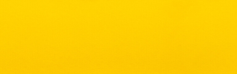 Good quality porous yellow cardboard paper texture close-up.