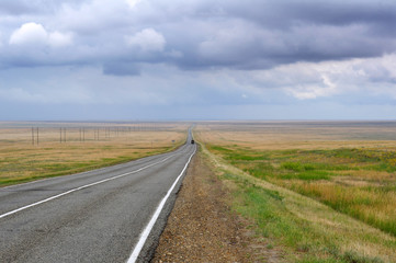 Fototapeta na wymiar the road in the steppe