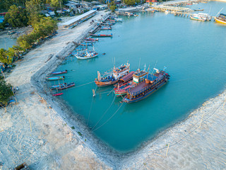 Aerial view of Baan Tai pier or Huatean Pier at Phangan island with clear blue sky, Thailand
