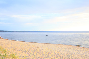 calm baltic sea at sunset and skyline