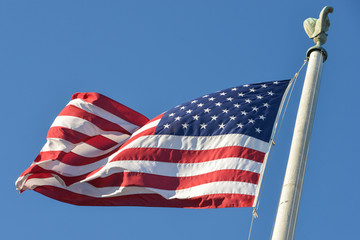 american flag waving in wind