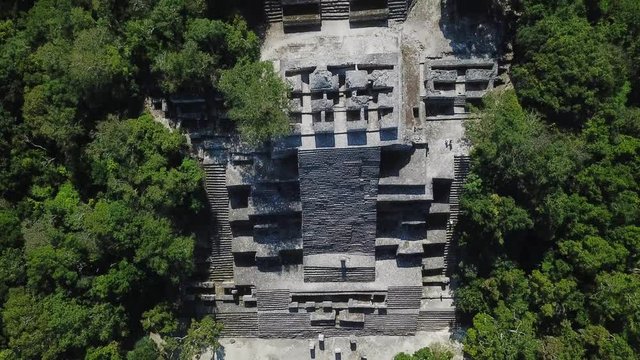 Aerial video flying towards the mayan Calakmul Temple in the Mexican Yucatan. The mayan ruins at Calakmul, Mexico