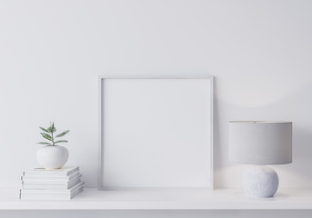 White modern frame  mock up in modern interior, close up for white lamp, books and green plant on shelf, minimal design