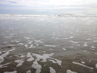 Waves in the Pacific Ocean with White Foam in Mejia, Arequipa / Peru