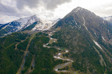 Aerial drone view of mountains in Andorra with snow on top