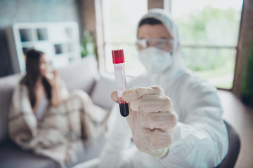 Photo blurred focus of sick patient lady call emergency doc virologist collected blood probe flask...