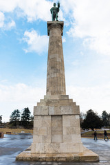Fototapeta na wymiar BELGRADE, SERBIA - FEBRUARY 4, 2017: Pobednik (The Victor) Monument in Kalemegdan Park. Pobednik is a monument in the Upper Town of the Belgrade Fortress. Belgrade, Serbia..