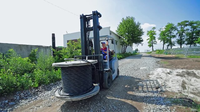 Forklift on construction site. Forklift loader at construction area
