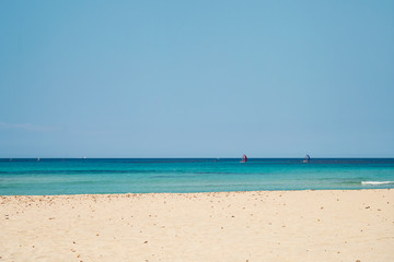 View on Mondello beach with windserf in the distance in Palermo in Sicily