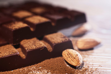 Chocolate with nuts close-up narrow zone of sharpness
