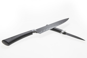 Two kitchen knives on a white background close-up