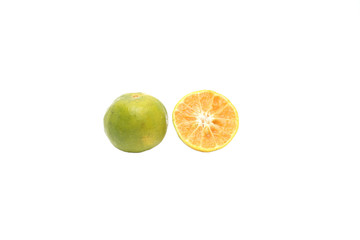 Close up a fresh orange cut in half just picked from the tree.