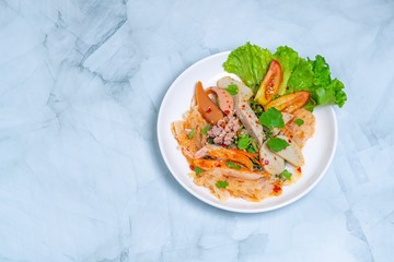 yam wun sen, Glass noodle spicy salad with Thai pork sausage ,mix vegetables,mushrooms, carrots,onions,minced pork and chilly in Thailand it call “Yam moo yo” Popular and famous food in Thai.