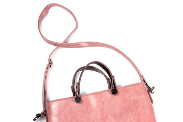 The upper part Is a red women's leather bag of rectangular shape with a long handle over the shoulder.